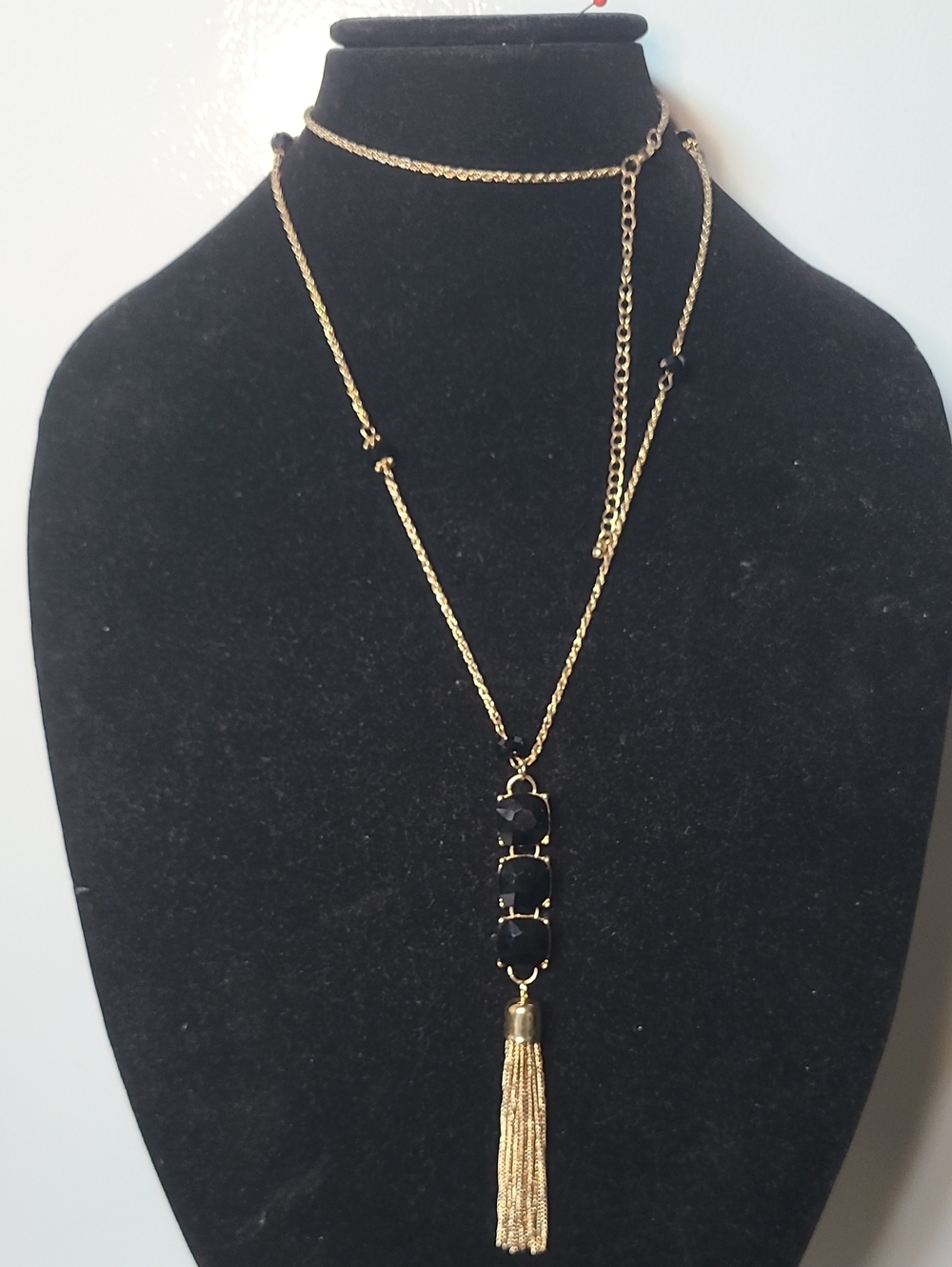 Gold Tassel Pendant Necklace with Black Stone Accents
